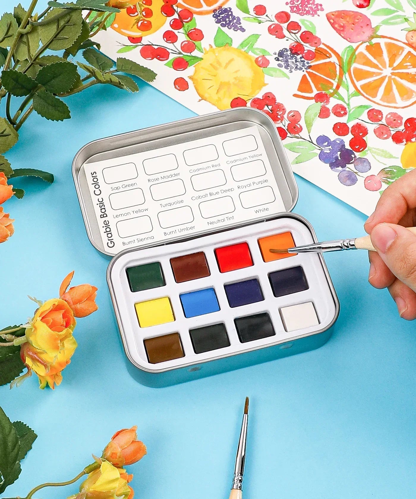 https://cdn.shopify.com/s/files/1/0729/6961/7689/files/Grabie_Watercolor_Pocket_Set_of_12_-_Essential_Colors_Grabie_Art_Supplies_Best_Watercolor_Artist_Watercolor_Miniature_Watercolor_Set.jpg?v=1772696350