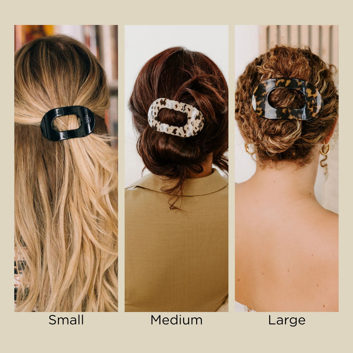 https://cdn.shopify.com/s/files/1/0065/8459/8593/files/jet-black-medium-flat-round-hair-clip-hair-clips-569556.jpg?v=1747849872