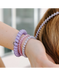 https://cdn.shoplightspeed.com/shops/636440/files/74601144/800x1024x2/teleties-lavender-mist-large-hair-ties.jpg