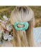 https://cdn.shoplightspeed.com/shops/636440/files/74599475/800x1024x2/teleties-spring-splash-large-flat-round-hair-clip.jpg
