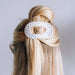 TELETIES White Polka Dot Party Medium Flat Round Hair Clip